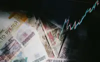 Курс доллара на рынке форекс упал ниже ₽84