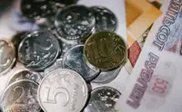 ЦБ оставил официальный курс доллара на 14 октября ниже ₽84